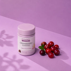 ISOWHEY Cranberry Gummies container with cranberries on a pink background
