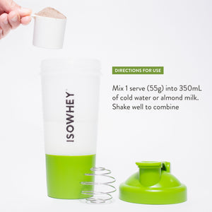 A person is holding a spoonful of Chocolate shake powder close to an opened IsoWhey shaker with the text 'Directions for Use'.