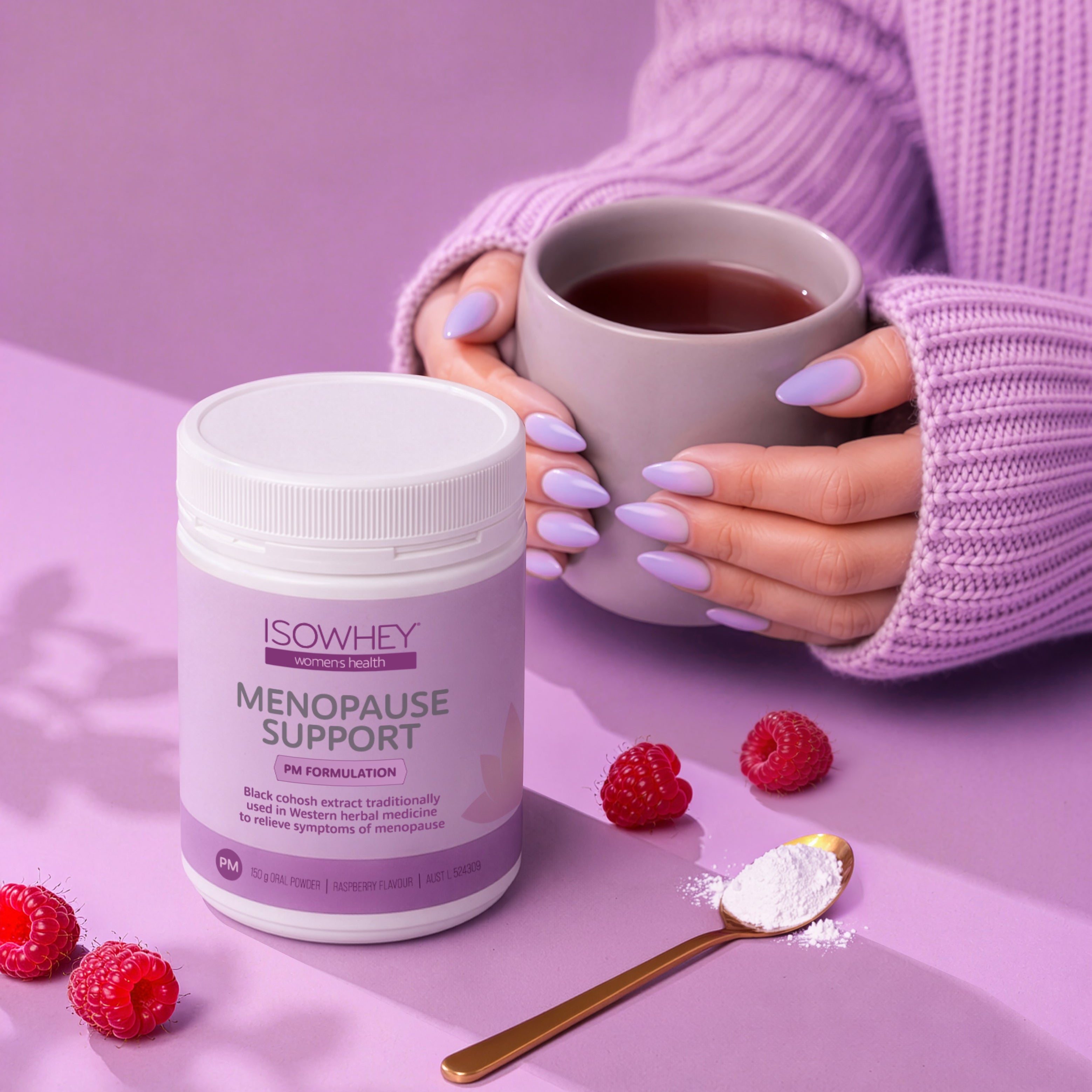 ISOWHEY Menopause Support supplement with a cup of tea and raspberries on a purple background