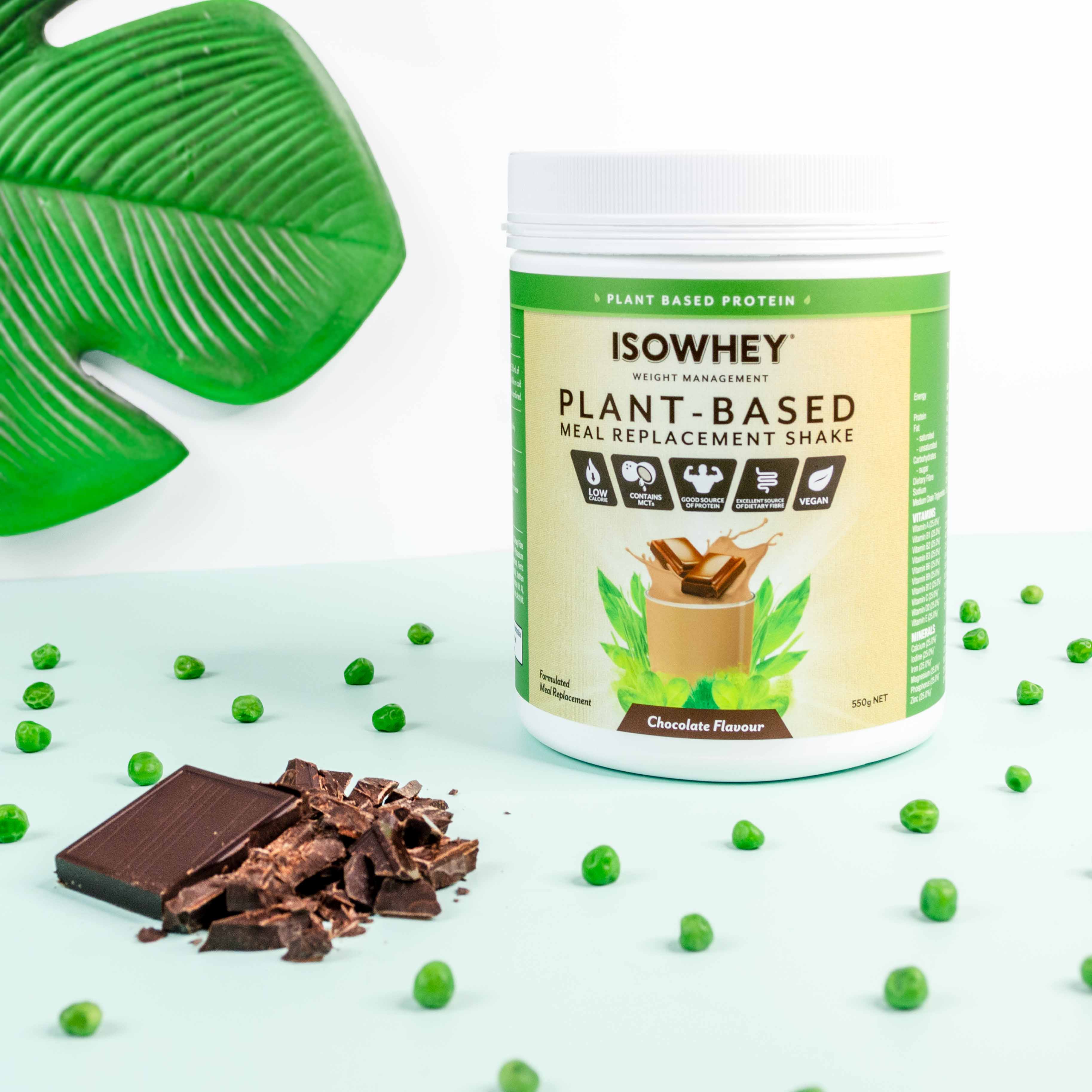IsoWhey Plant-Based Meal Replacement Chocolate Shake 550g witth a piece of chocolate in the foreground